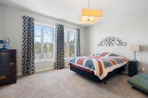 5 Riviera Crescent, Cochrane, AB - Indoor Photo Showing Bedroom