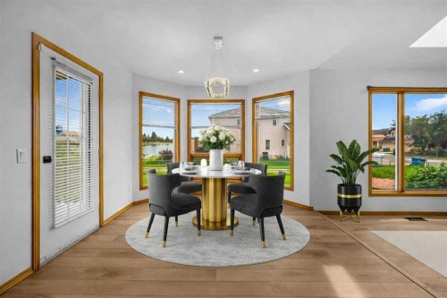 208 Coral Shores Bay Ne, Calgary, AB - Indoor Photo Showing Dining Room