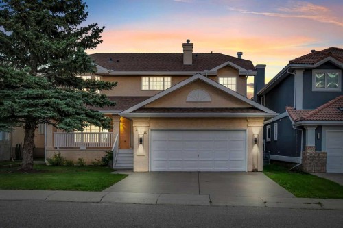 208 Coral Shores Bay Ne, Calgary, AB - Outdoor With Facade
