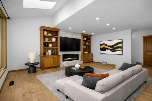 208 Coral Shores Bay Ne, Calgary, AB - Indoor Photo Showing Living Room With Fireplace