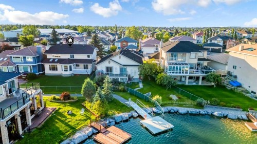 208 Coral Shores Bay Ne, Calgary, AB - Outdoor With Body Of Water
