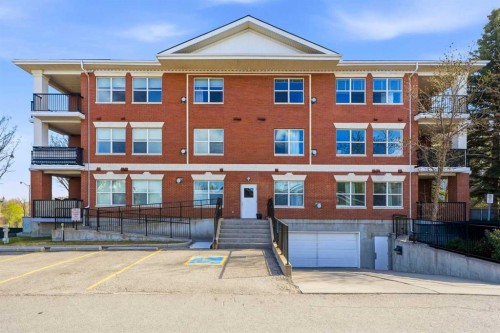 207-60 Promenade Way Se, Calgary, AB - Outdoor With Balcony With Facade