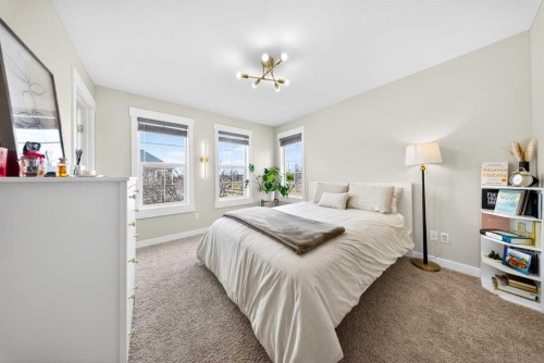 212 Cascades Pass, Chestermere, AB - Indoor Photo Showing Bedroom