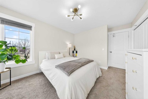 212 Cascades Pass, Chestermere, AB - Indoor Photo Showing Bedroom
