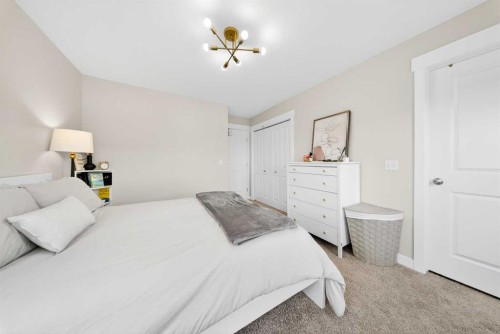 212 Cascades Pass, Chestermere, AB - Indoor Photo Showing Bedroom