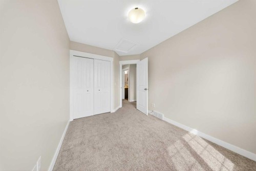 212 Cascades Pass, Chestermere, AB - Indoor Photo Showing Other Room
