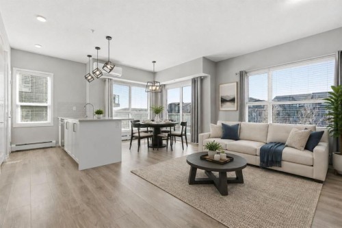204-4150 Seton Drive Se, Calgary, AB - Indoor Photo Showing Living Room