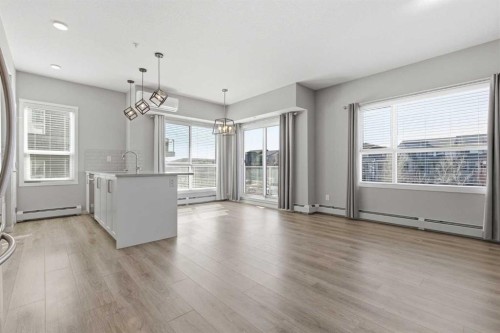 204-4150 Seton Drive Se, Calgary, AB - Indoor Photo Showing Kitchen