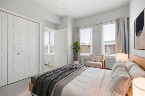 204-4150 Seton Drive Se, Calgary, AB - Indoor Photo Showing Bedroom