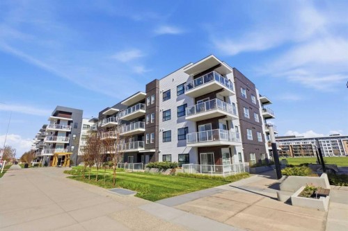 204-4150 Seton Drive Se, Calgary, AB - Outdoor With Balcony With Facade