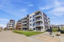 204-4150 Seton Drive Se, Calgary, AB  - Outdoor With Balcony With Facade 
