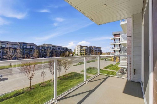 204-4150 Seton Drive Se, Calgary, AB - Outdoor With Balcony With Exterior
