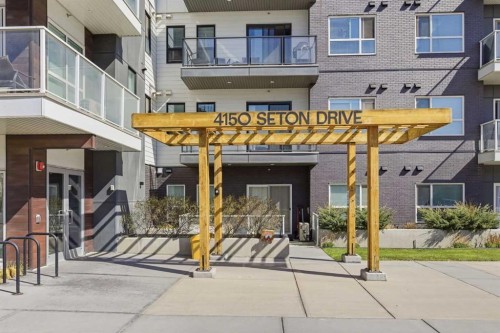 204-4150 Seton Drive Se, Calgary, AB - Outdoor With Balcony