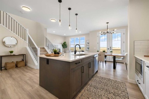 450 Kinniburgh Loop, Chestermere, AB - Indoor Photo Showing Kitchen With Double Sink With Upgraded Kitchen