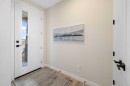 450 Kinniburgh Loop, Chestermere, AB  - Indoor Photo Showing Other Room 