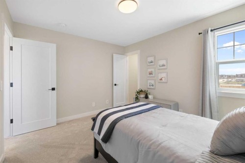 450 Kinniburgh Loop, Chestermere, AB - Indoor Photo Showing Bedroom