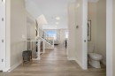 450 Kinniburgh Loop, Chestermere, AB  - Indoor Photo Showing Other Room 