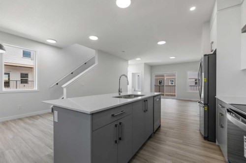 803-90 Corner Meadows Manor Ne, Calgary, AB - Indoor Photo Showing Kitchen With Double Sink