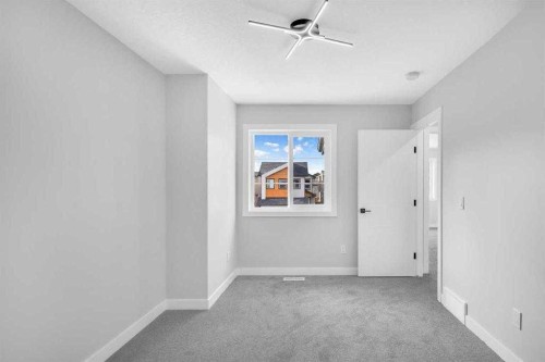 110 Saddlepeace Crescent Ne, Calgary, AB - Indoor Photo Showing Other Room