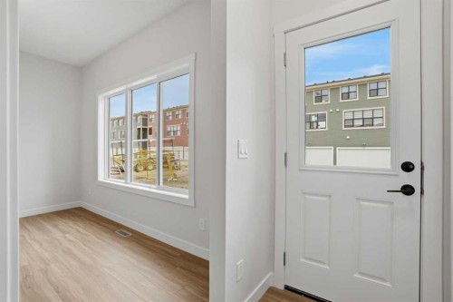 80 Buffaloberry Manor Se, Calgary, AB - Indoor Photo Showing Other Room