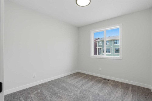 80 Buffaloberry Manor Se, Calgary, AB - Indoor Photo Showing Other Room