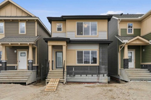 80 Buffaloberry Manor Se, Calgary, AB - Outdoor With Facade