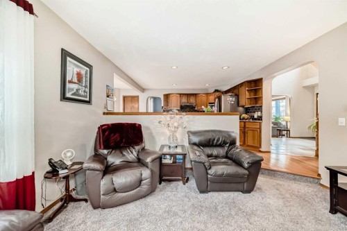 219 Hawkstone Close Nw, Calgary, AB - Indoor Photo Showing Living Room