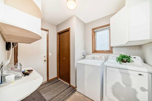 219 Hawkstone Close Nw, Calgary, AB - Indoor Photo Showing Laundry Room