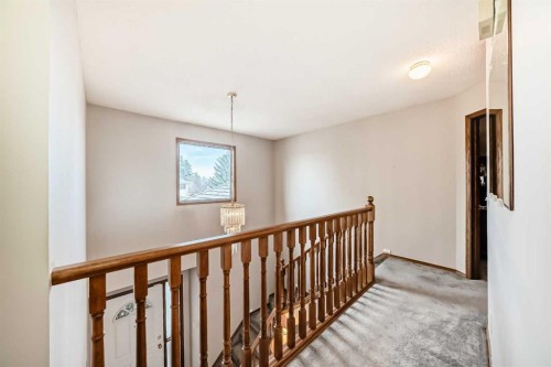 219 Hawkstone Close Nw, Calgary, AB - Indoor Photo Showing Other Room