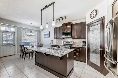 795 New Brighton Drive Se, Calgary, AB - Indoor Photo Showing Kitchen With Stainless Steel Kitchen With Double Sink With Upgraded Kitchen