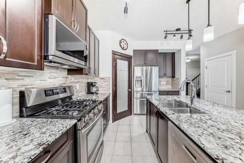 795 New Brighton Drive Se, Calgary, AB - Indoor Photo Showing Kitchen With Stainless Steel Kitchen With Double Sink With Upgraded Kitchen