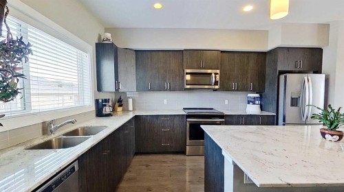 818 Cornerstone Boulevard Ne, Calgary, AB - Indoor Photo Showing Kitchen With Stainless Steel Kitchen With Double Sink