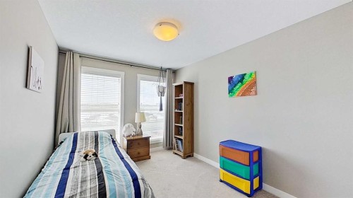 818 Cornerstone Boulevard Ne, Calgary, AB - Indoor Photo Showing Bedroom