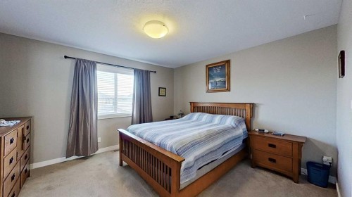 818 Cornerstone Boulevard Ne, Calgary, AB - Indoor Photo Showing Bedroom