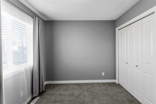 23 Marquis Link Se, Calgary, AB - Indoor Photo Showing Other Room