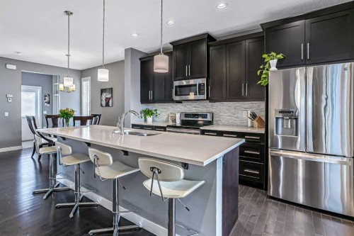 23 Marquis Link Se, Calgary, AB - Indoor Photo Showing Kitchen With Stainless Steel Kitchen With Upgraded Kitchen