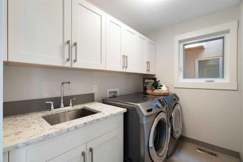 2201 Bowness Road Nw, Calgary, AB - Indoor Photo Showing Laundry Room