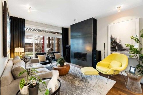 2201 Bowness Road Nw, Calgary, AB - Indoor Photo Showing Living Room With Fireplace