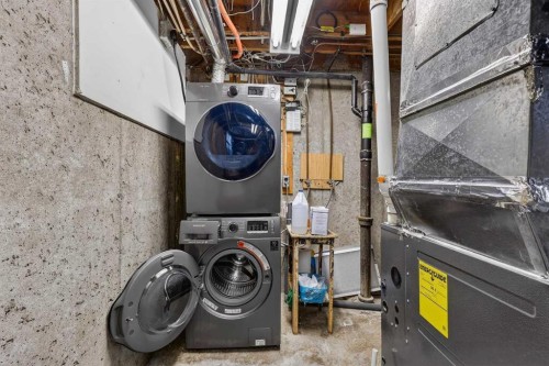 563 Regal Park Ne, Calgary, AB - Indoor Photo Showing Laundry Room