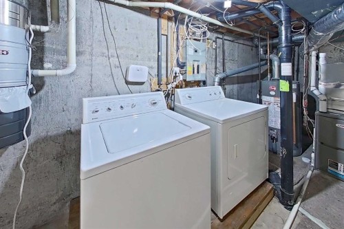 2537 9 Avenue Se, Calgary, AB - Indoor Photo Showing Laundry Room