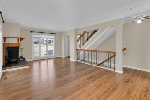2537 9 Avenue Se, Calgary, AB - Indoor Photo Showing Living Room With Fireplace