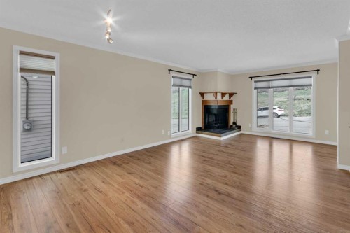 2537 9 Avenue Se, Calgary, AB - Indoor Photo Showing Living Room With Fireplace
