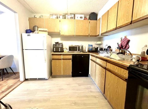 806-5204 Dalton Drive Nw, Calgary, AB - Indoor Photo Showing Kitchen