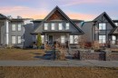207 Elgin Meadows Gardens Se, Calgary, AB  - Outdoor With Deck Patio Veranda With Facade 
