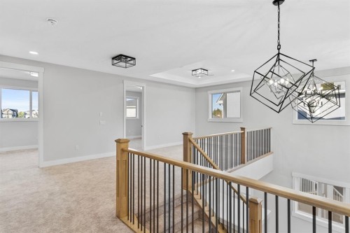 215 Kinniburgh Place, Chestermere, AB - Indoor Photo Showing Other Room