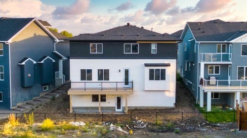 215 Kinniburgh Place, Chestermere, AB - Outdoor With Facade