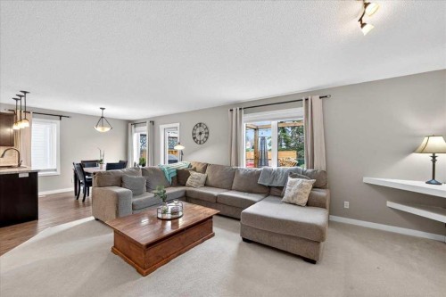 127 Hidden Ranch Terrace Nw, Calgary, AB - Indoor Photo Showing Living Room