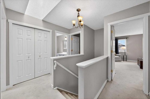 127 Hidden Ranch Terrace Nw, Calgary, AB - Indoor Photo Showing Other Room
