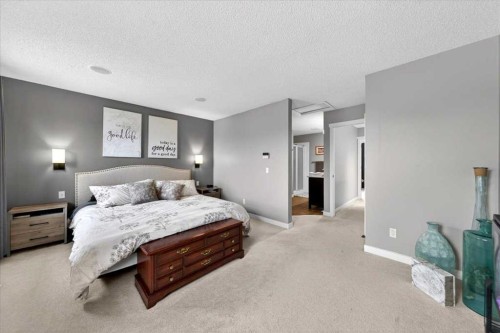 127 Hidden Ranch Terrace Nw, Calgary, AB - Indoor Photo Showing Bedroom