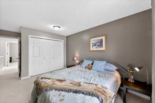 127 Hidden Ranch Terrace Nw, Calgary, AB - Indoor Photo Showing Bedroom